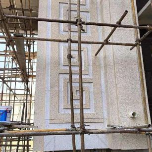 郴州 黄金麻花岗岩别墅外墙干挂回纹造型效果