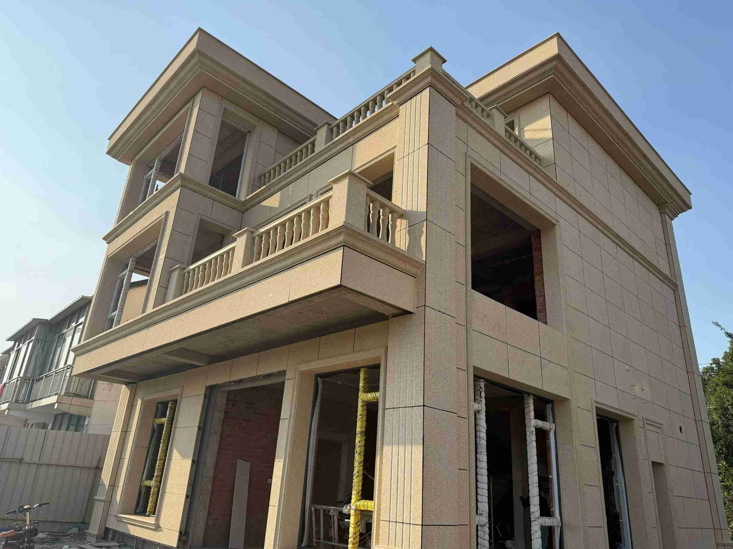 郴州 黄金麻花岗岩石材荔枝面外墙干挂效果展示